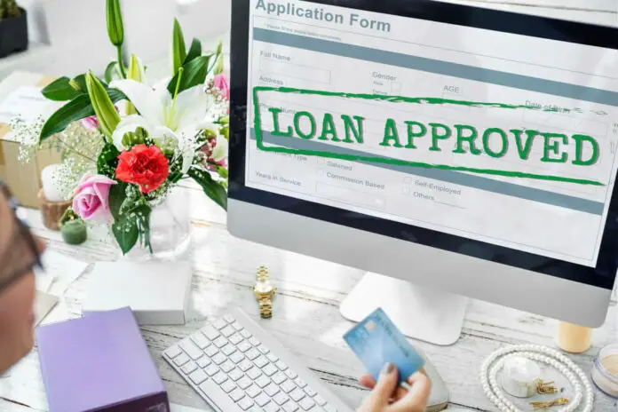 Loan Approved on Computer screen