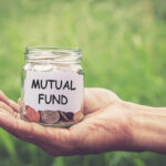 jar in hand with mutual fund written on it