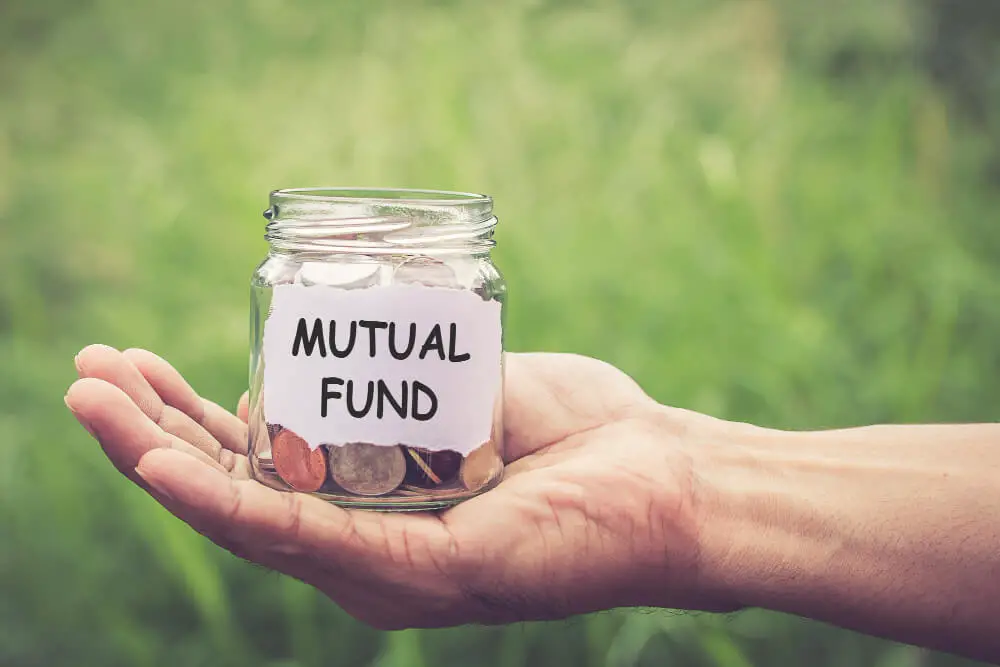 jar in hand with mutual fund written on it